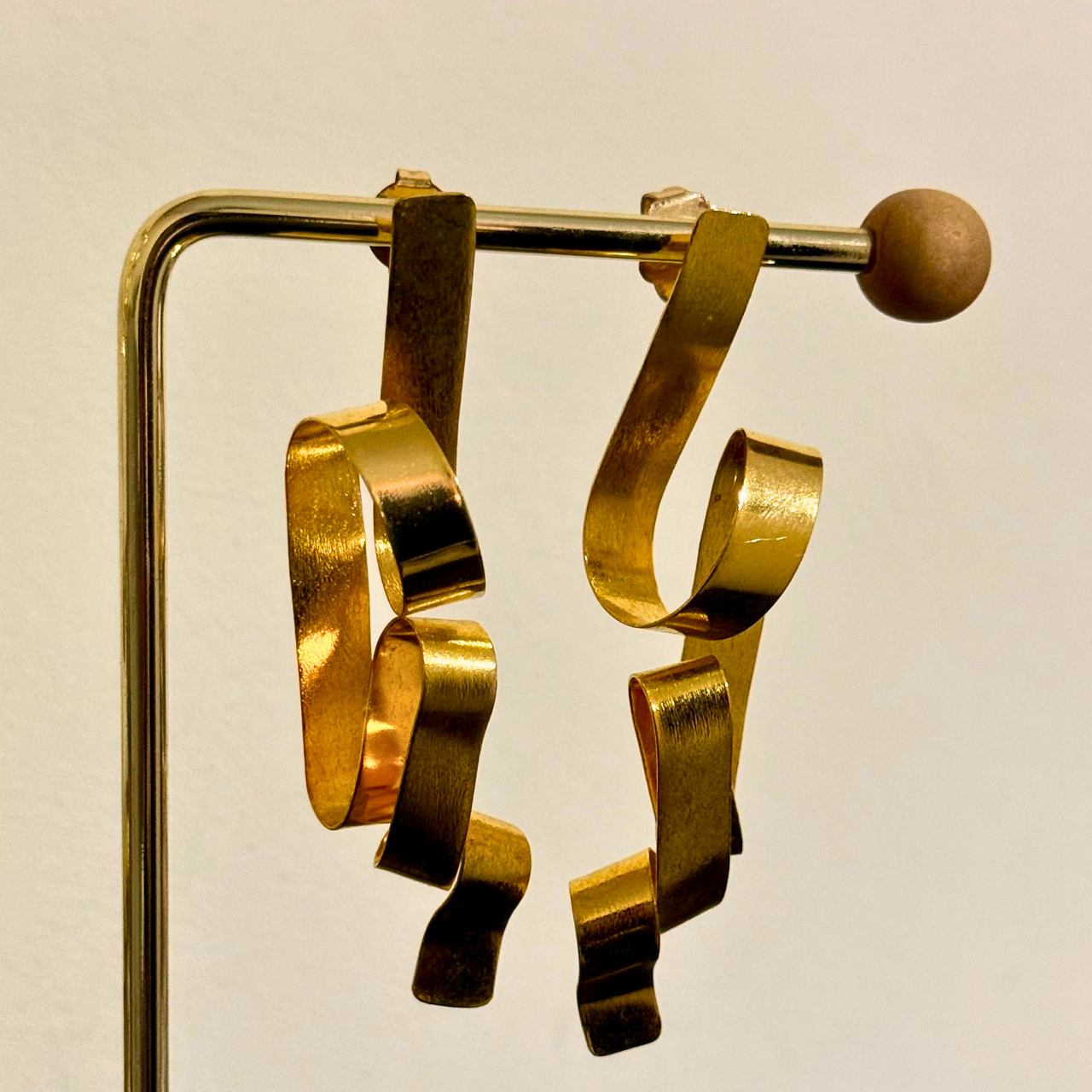 ARETES LAZOS DE VIENTO